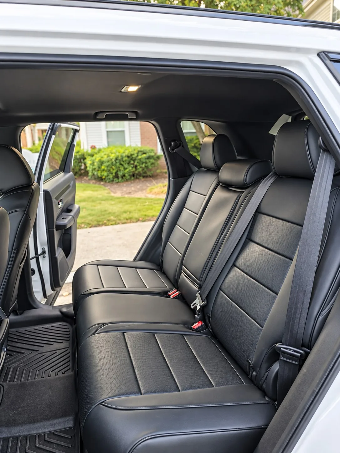 Rear passenger seats of the Honda CR-V Hybrid with the door open